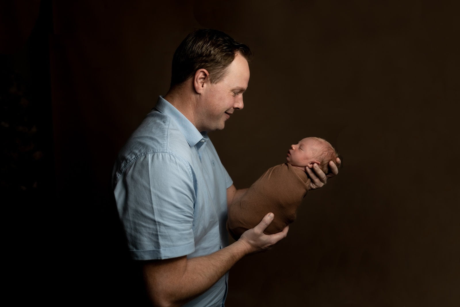 newborn foto met vader